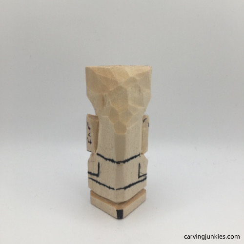 Back details on troll carving