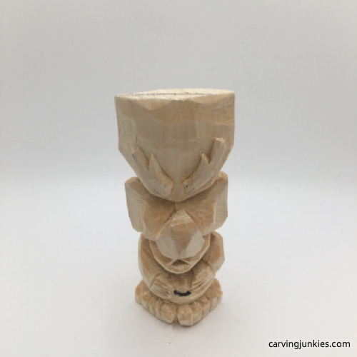 Carved details on troll carving