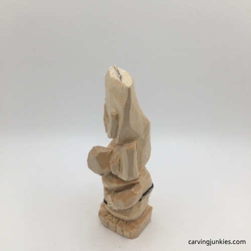 Left view of carved wood troll