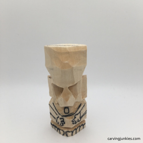 Drawn details on troll carving