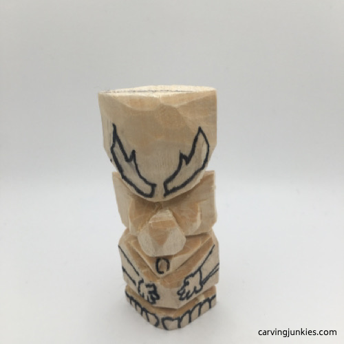 Eyebrows on troll carving