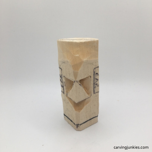 Cut nose on troll carving