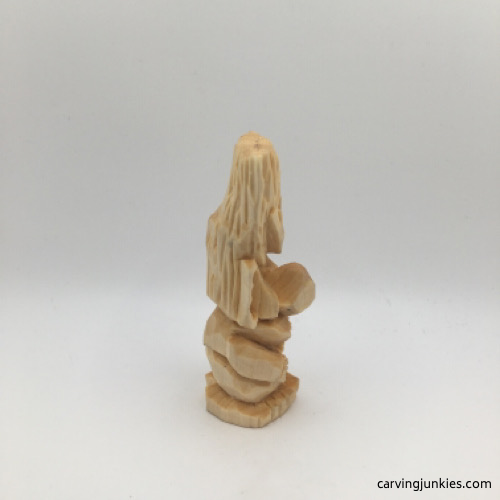 Right view of unpainted troll carving