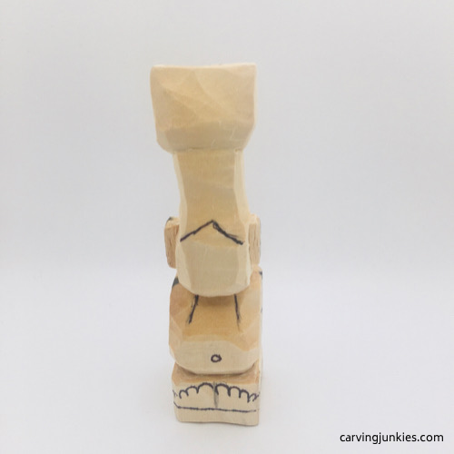 Drawn details on troll wood carving Feet drawn on troll wood carving