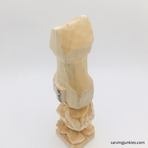 Back side of feet on troll wood carving Back view of feet on troll wood carving