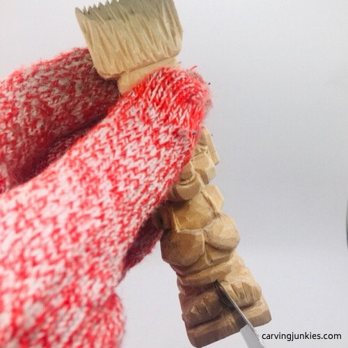 Separating legs on troll wood carving Splitting legs on troll wood carving