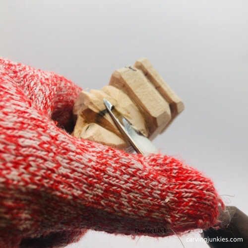 Shaping sides of troll wood carving Narrowing sides of troll wood carving