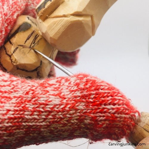 Carving bikini top on troll wood carving Cutting bikini top on troll wood carving