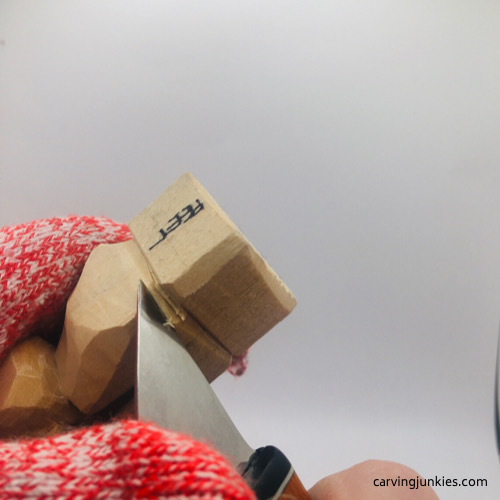 Carving belly on troll wood carving Shaping belly on troll wood carving