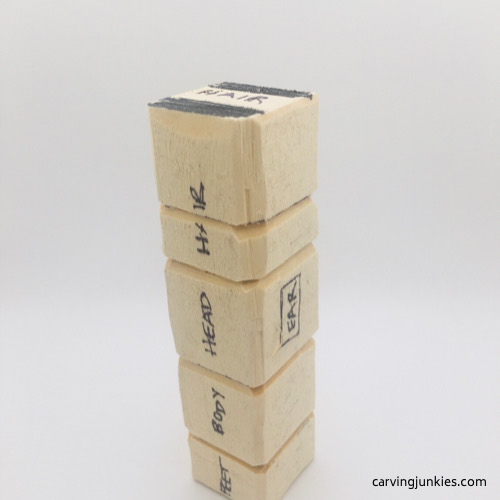 Carved guidelines on troll wood carving Cut guidelines on troll wood carving