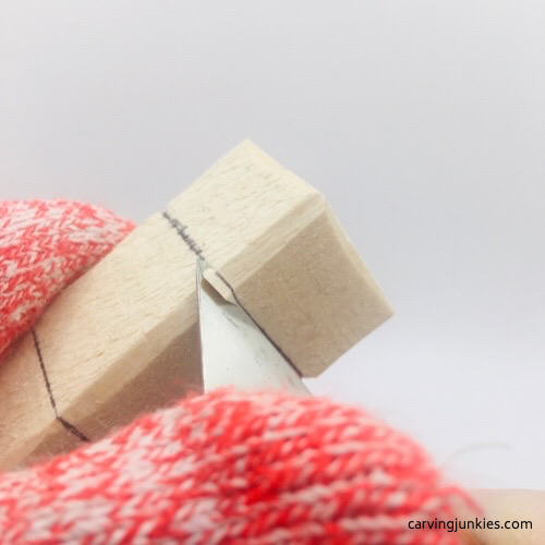 Slicing wood on troll wood carving Removing wood on troll wood carving