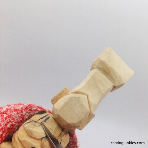 Shaving down chest on troll wood carving Carving chest on troll wood carving