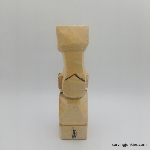 FinI shed front shoulders on troll wood carving Shoulders on troll wood carving