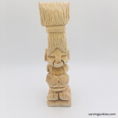 Smile lines in pen on troll wood carving Smiles lines on troll wood carving