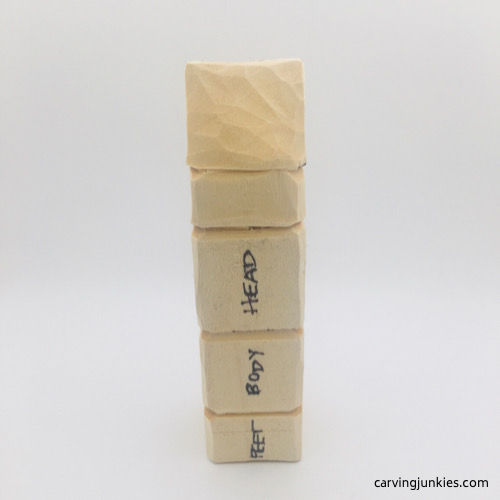 Top section of hair on troll wood carving Hair takes shape on troll wood carving