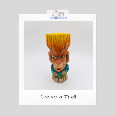 Two painted wooden trolls