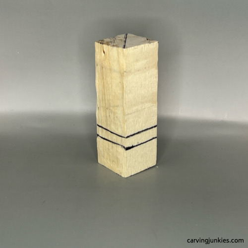 Guidelines sketched for Valentine heart wood carving