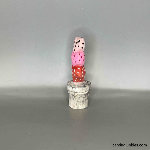 Left view of painted Valentine heart wood carving