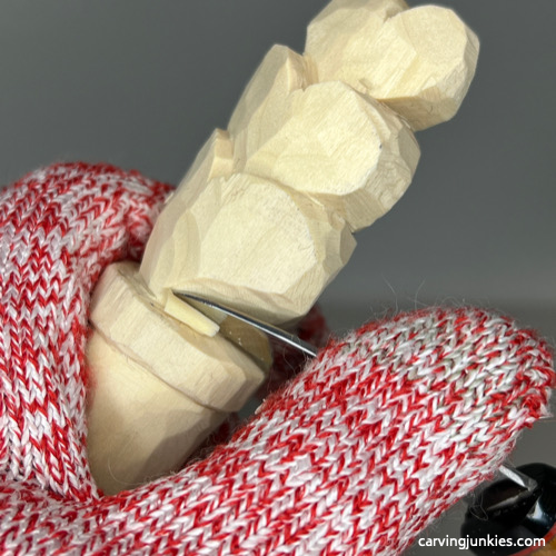 Finalizing shape of Valentine wood carving