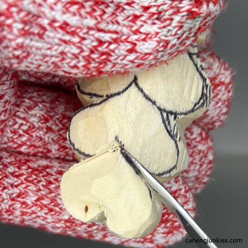 Separating hearts on Valentine heart wood carving