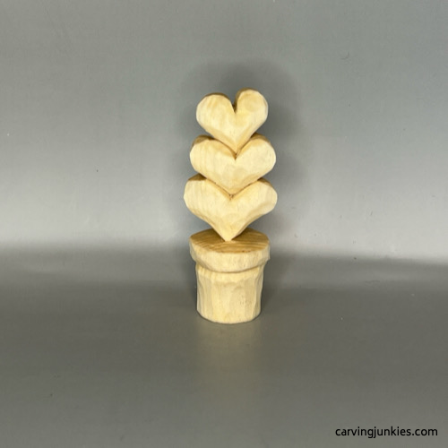 Back view of unpainted Valentine heart wood carving