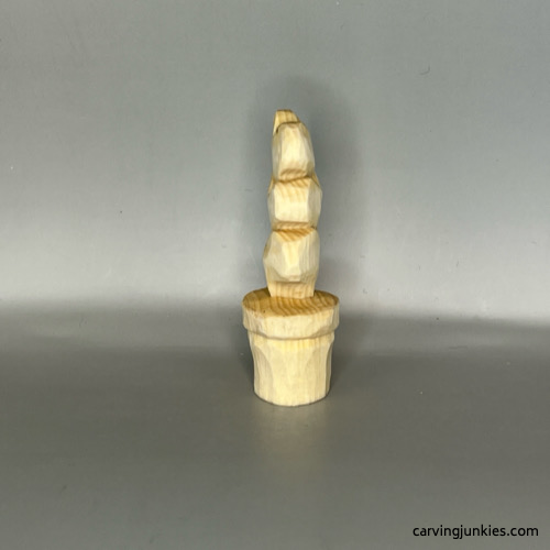 Left view of unpainted Valentine heart wood carving