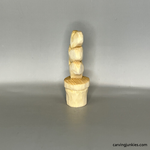 Right view of unpainted Valentine heart wood carving