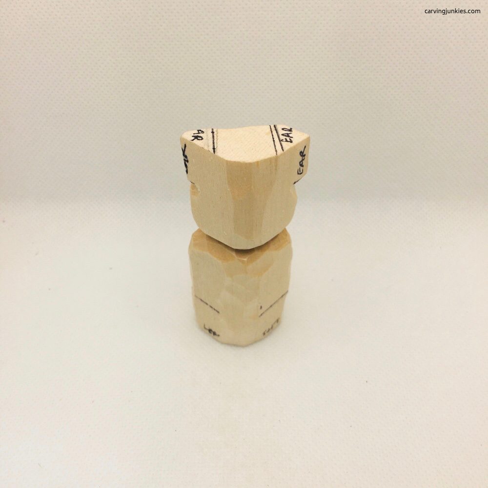 Back view of bear whittling