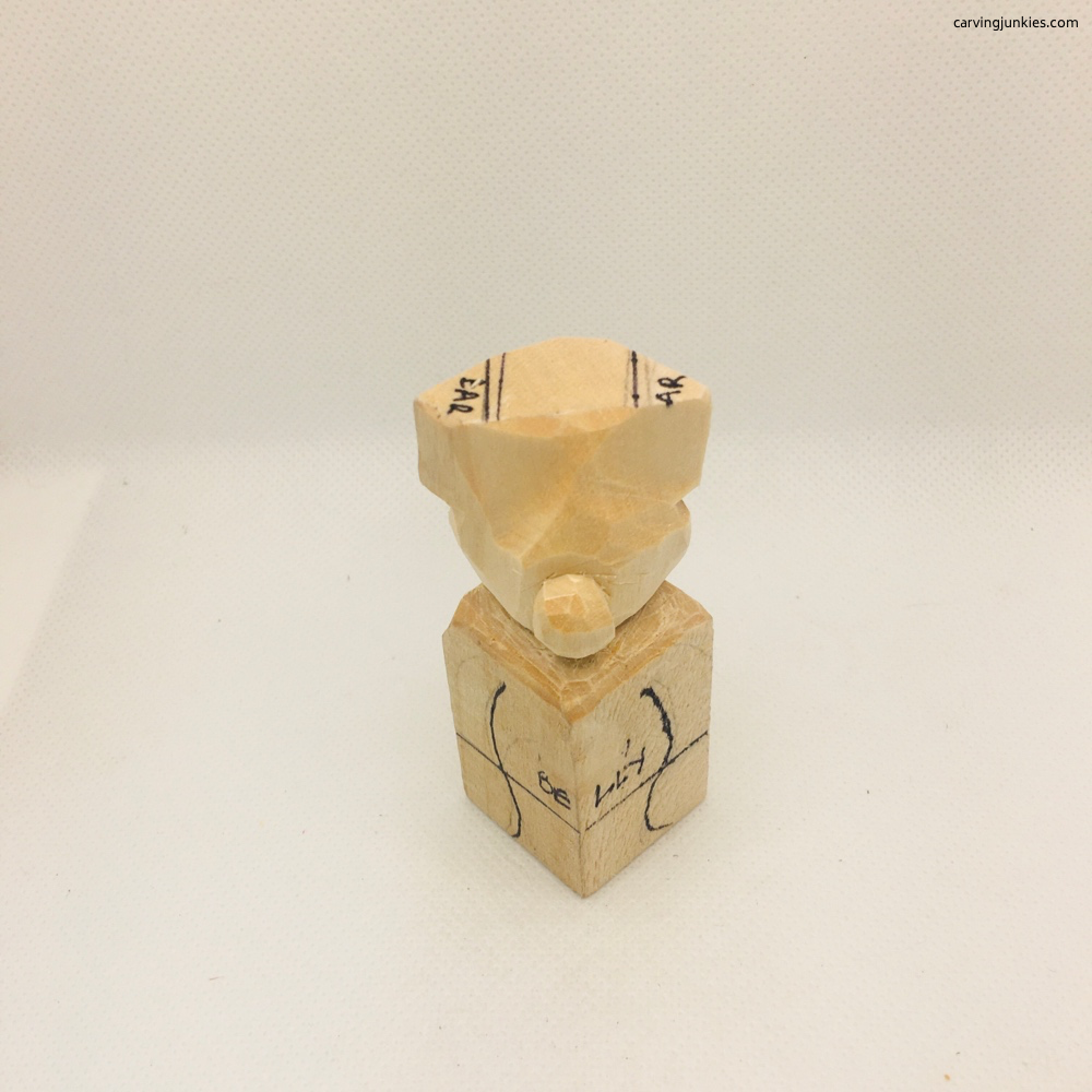 Rounding snout of bear whittling