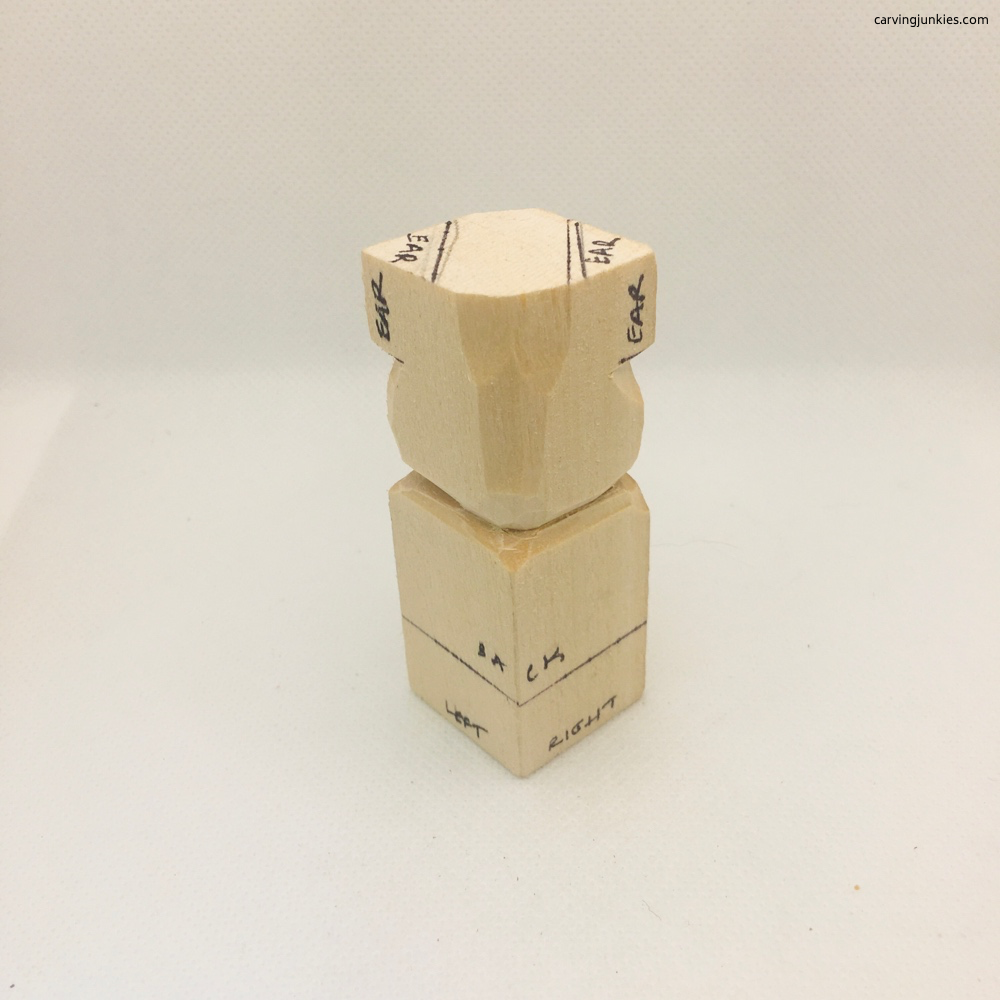 Back view of bear wood carving