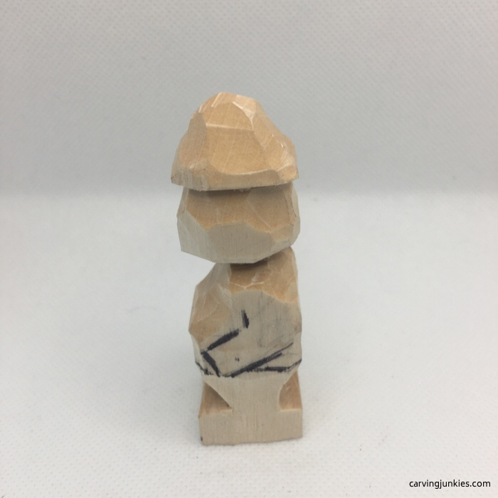 Left arm drawn on wood carving