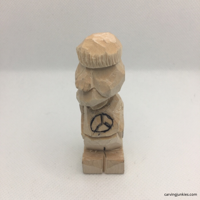 Smiles lines on wood carving