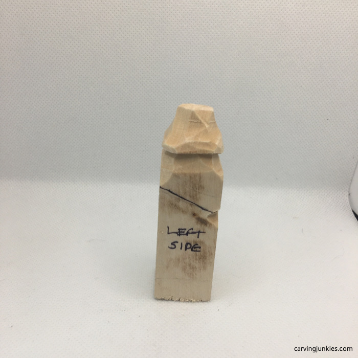 Left side of carved hat