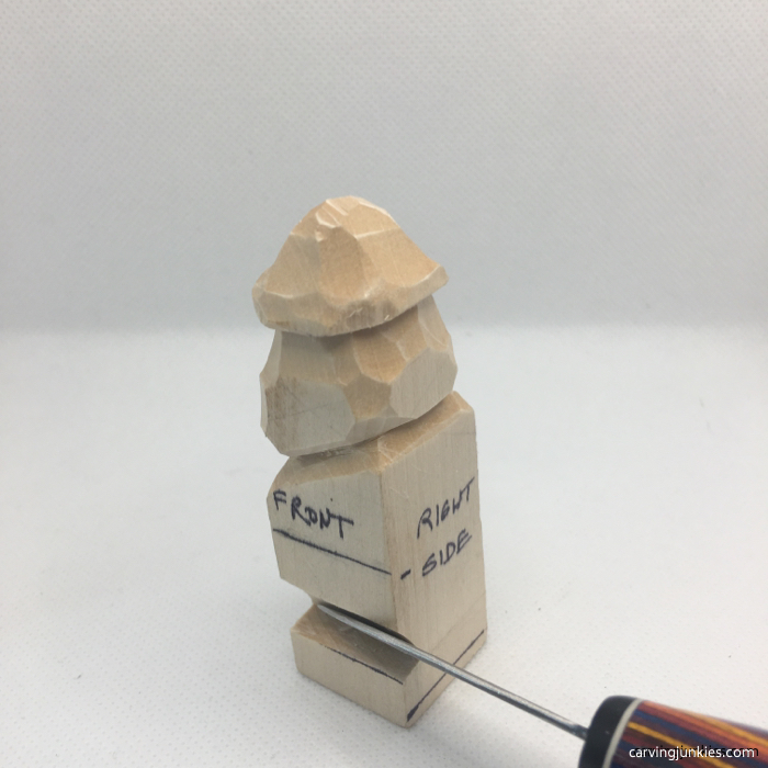 Feet added to wood carving