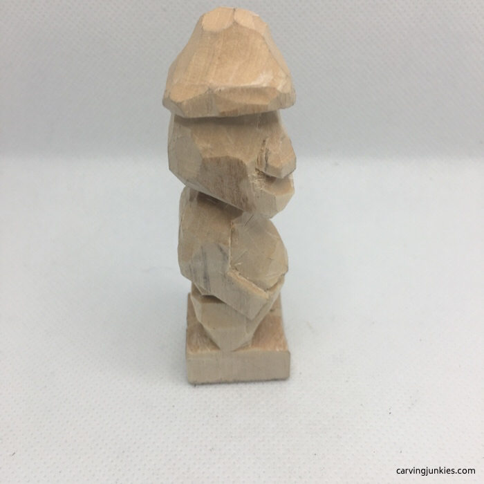 Side view of nose on wood carving