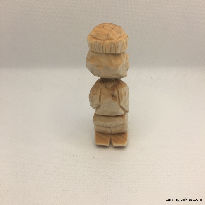 Back view of completed wood carving