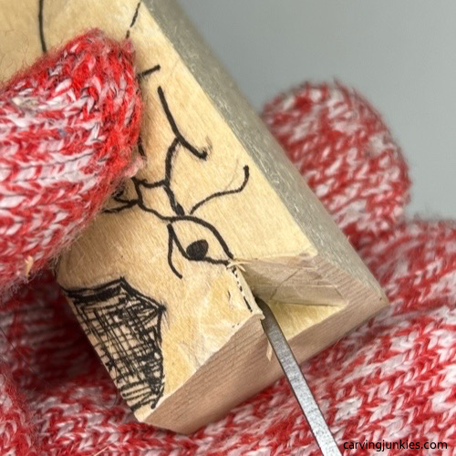 Deeper pyramid cuts on cat whittling Making deeper cuts on whittled cat