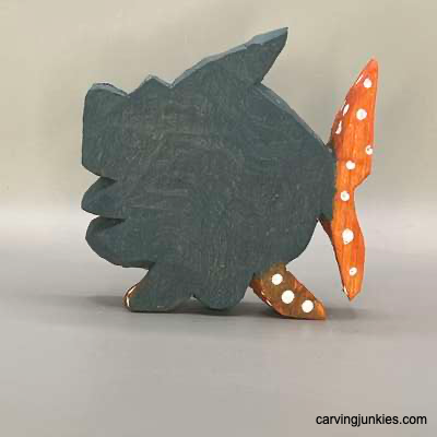 Back view of painted wood carved fish