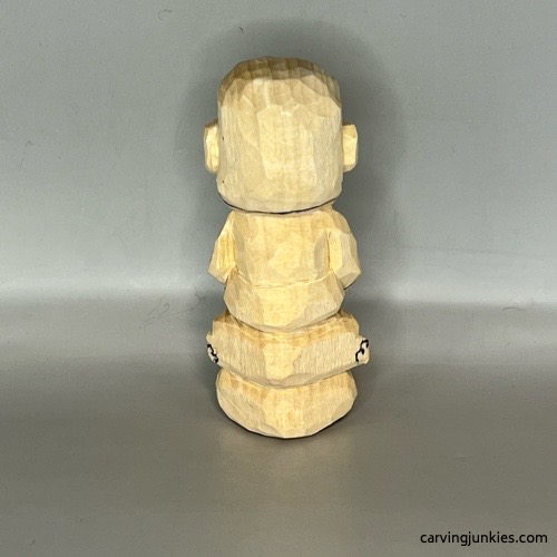 Back details on wood carved Buddha