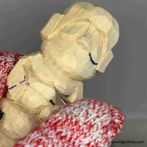 Carving chest on wood carved Buddha