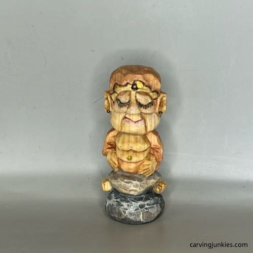 Front of painted wood carved Buddha