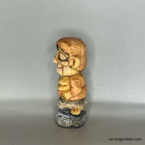 Right view of painted wood carved Buddha