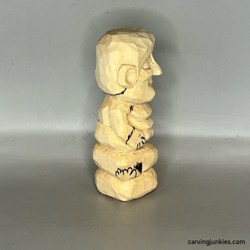 Right details on wood carved Buddha