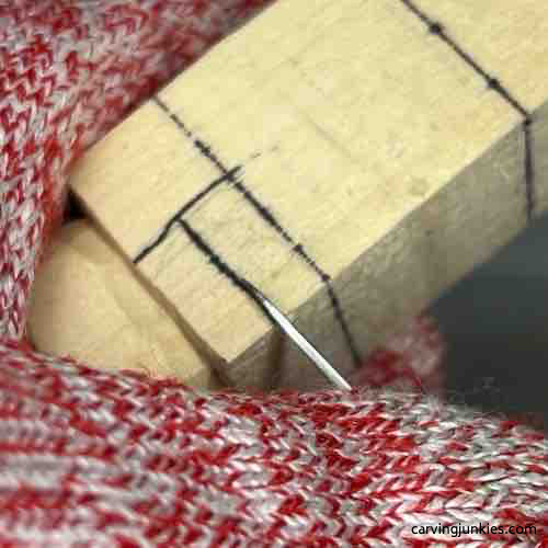 Using stop cut to carve wood buddha guideline