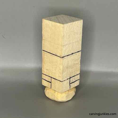 Toe guidelines on wood carved Buddha