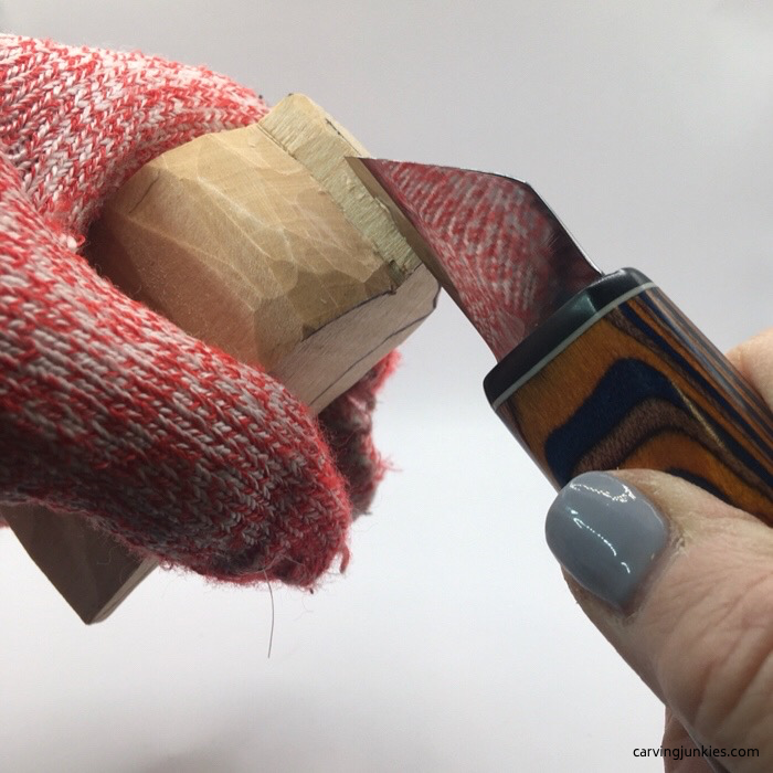 Carving cardinal beak