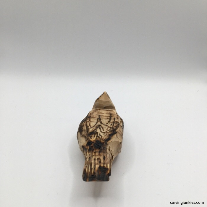 Back view of wood burned cardinal