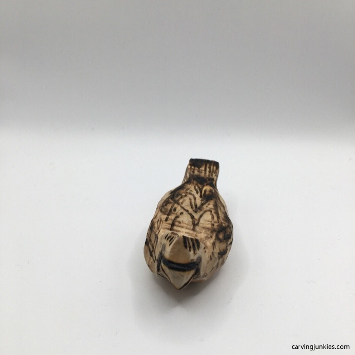 Front view of wood burned cardinal