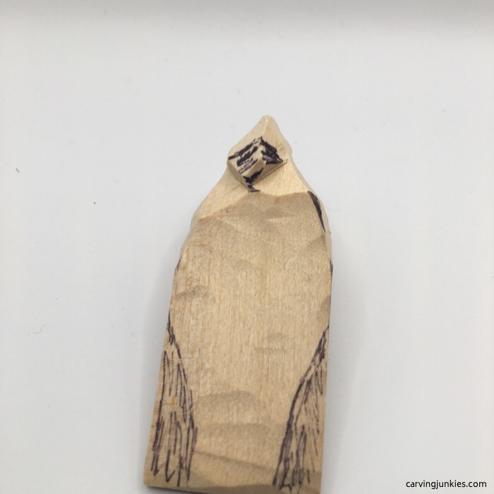 Cardinal head in wood