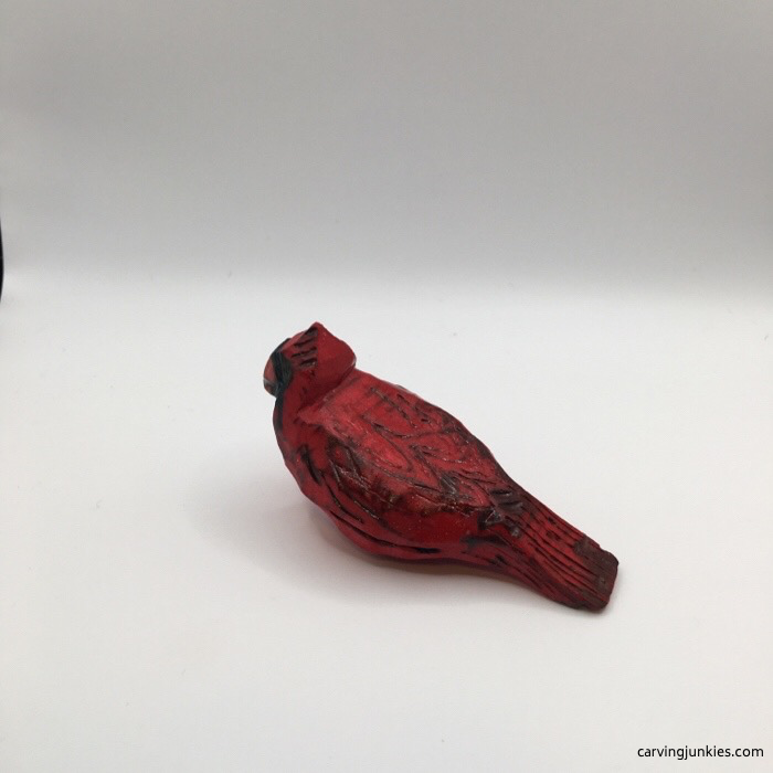 Left side of painted wood cardinal